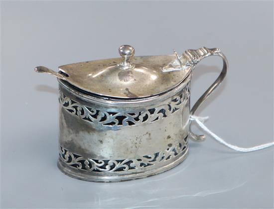 A George III pierced silver oval mustard by Henry Chawner, London, 1791, 10cm.